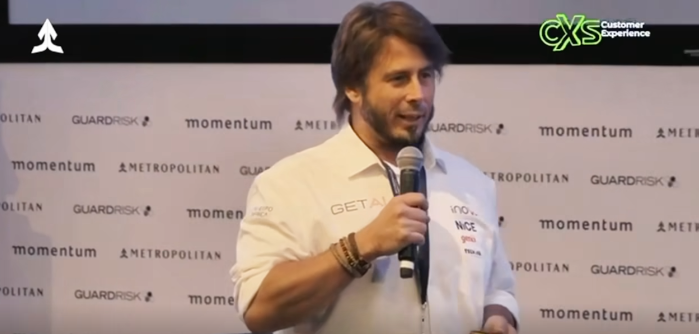 Werner Tenten delivering a keynote to a live audience